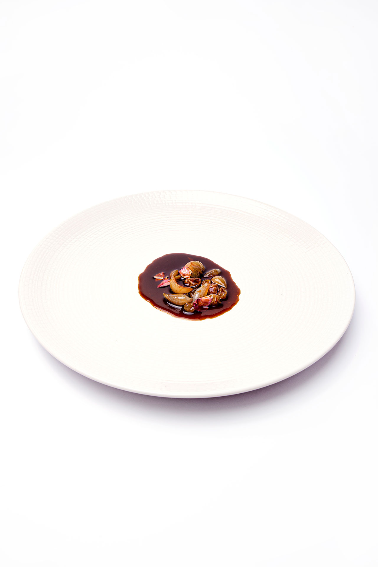 Pigeon And Star Anise Jus With Silverskin Onion Confit And Roses | Gastronomixs