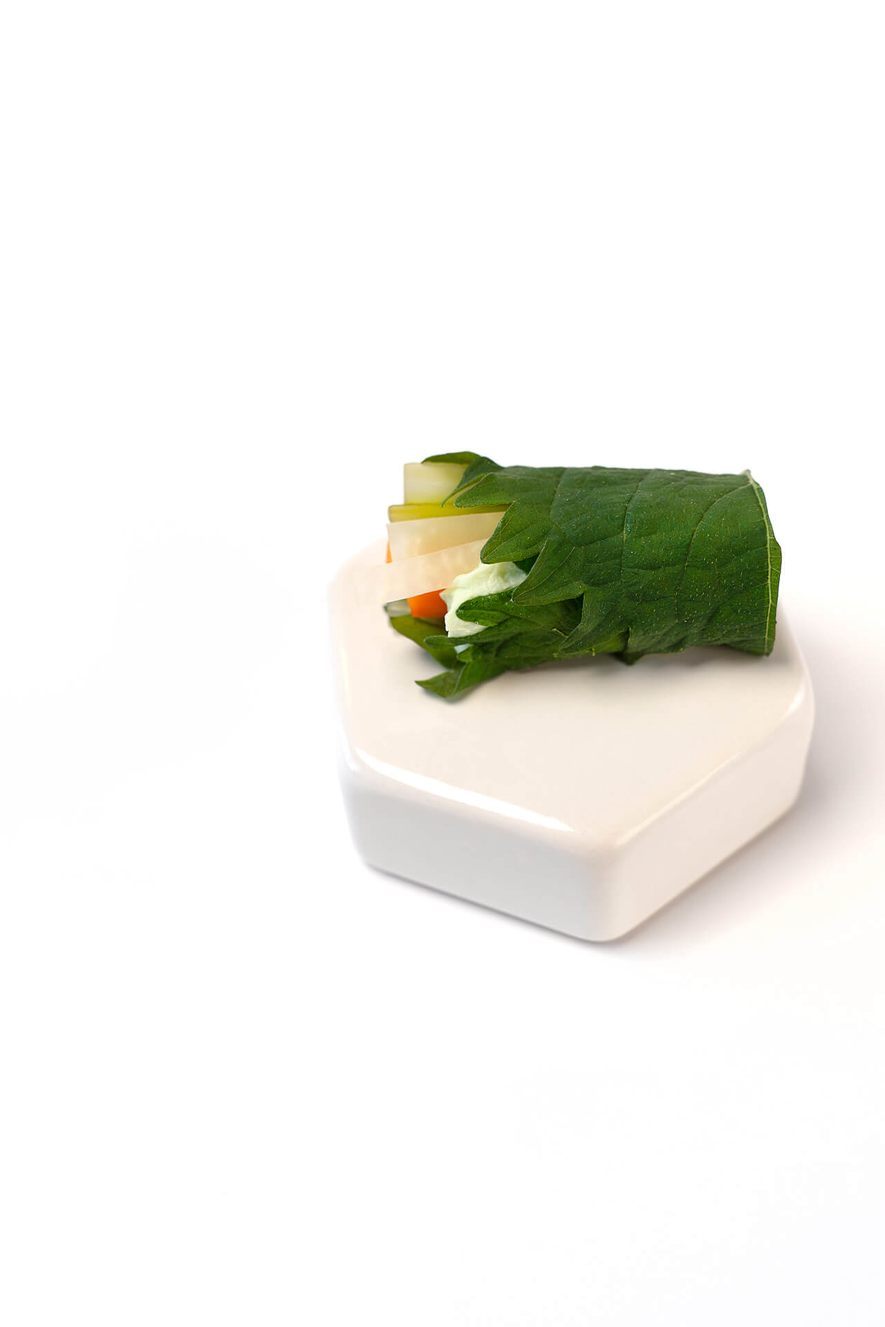 Roll of shiso green, wasabi cream cheese and pickled vegetables | Gastronomixs