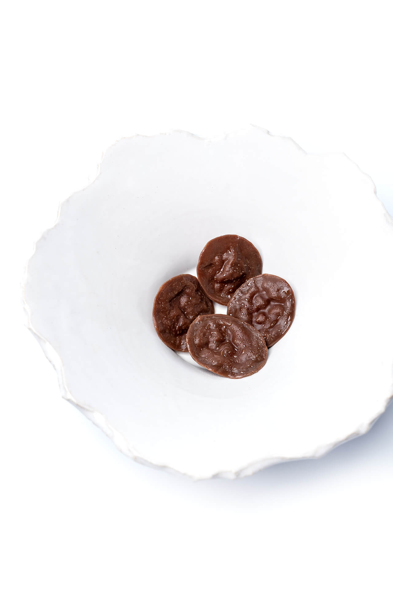 Cocoa buttons with wild boar | Gastronomixs