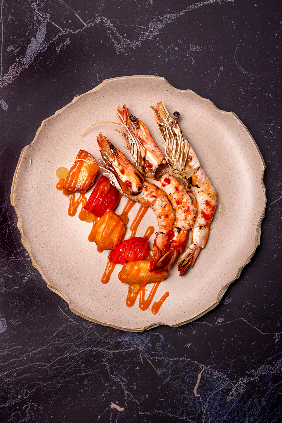 Gamba piri piri from the kamado barbecue with tomato