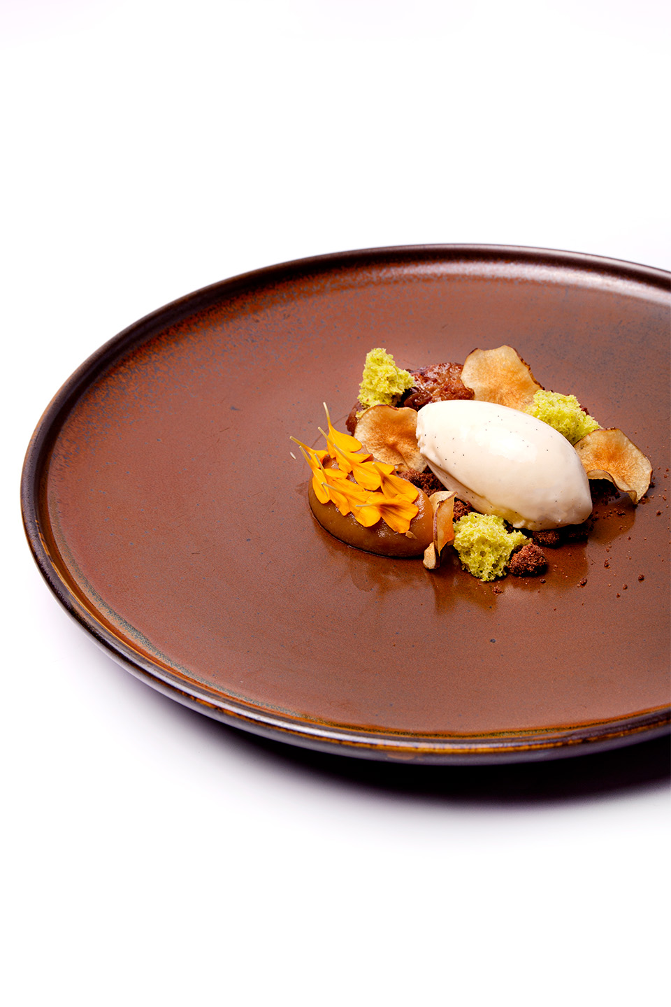 Jerusalem artichoke with chocolate crumble, pistachio sponge cake, and vanilla ice cream
