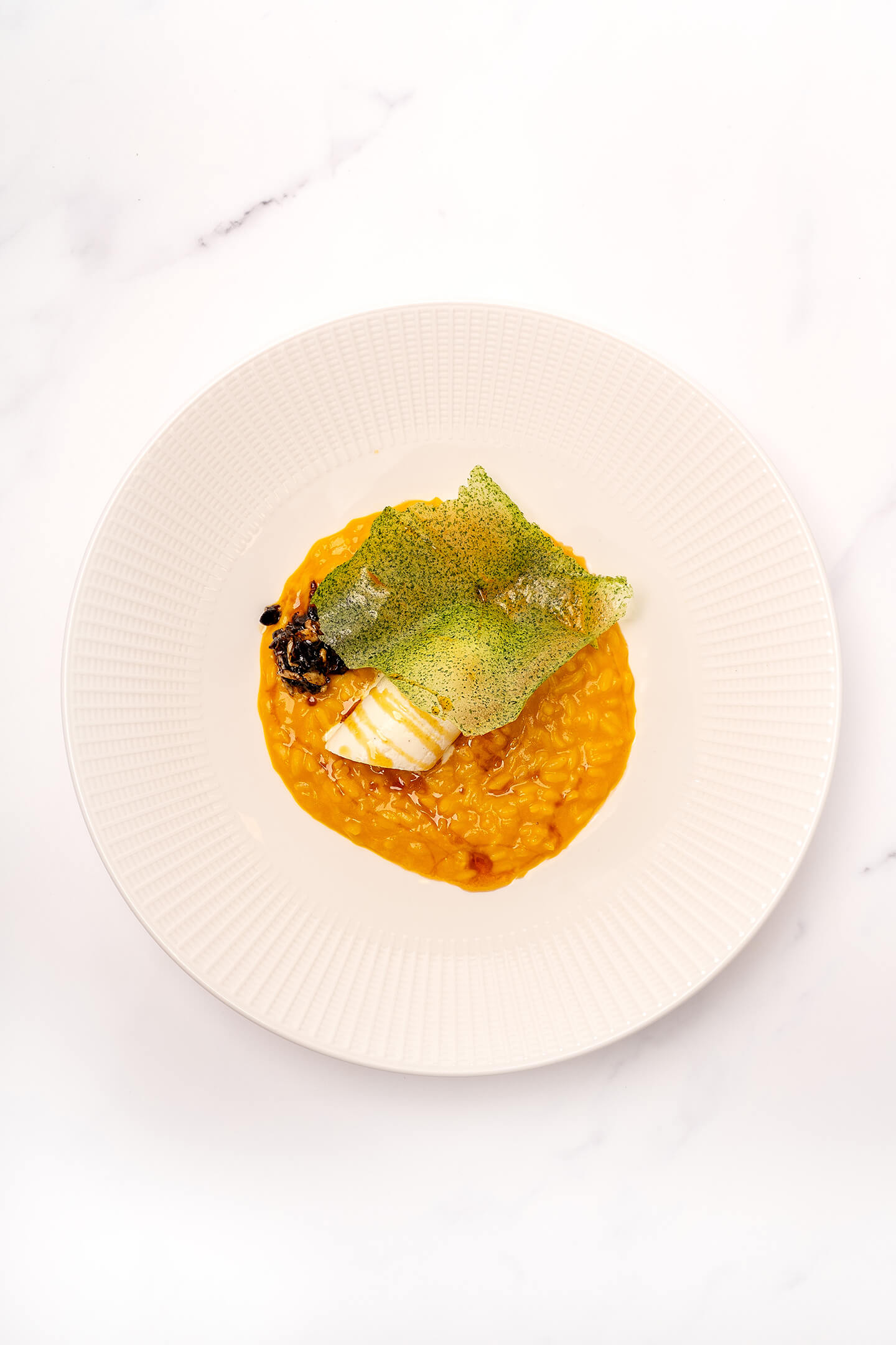 Wortel risotto met geitenkaasmousse en honing karamel met gezouten citroen