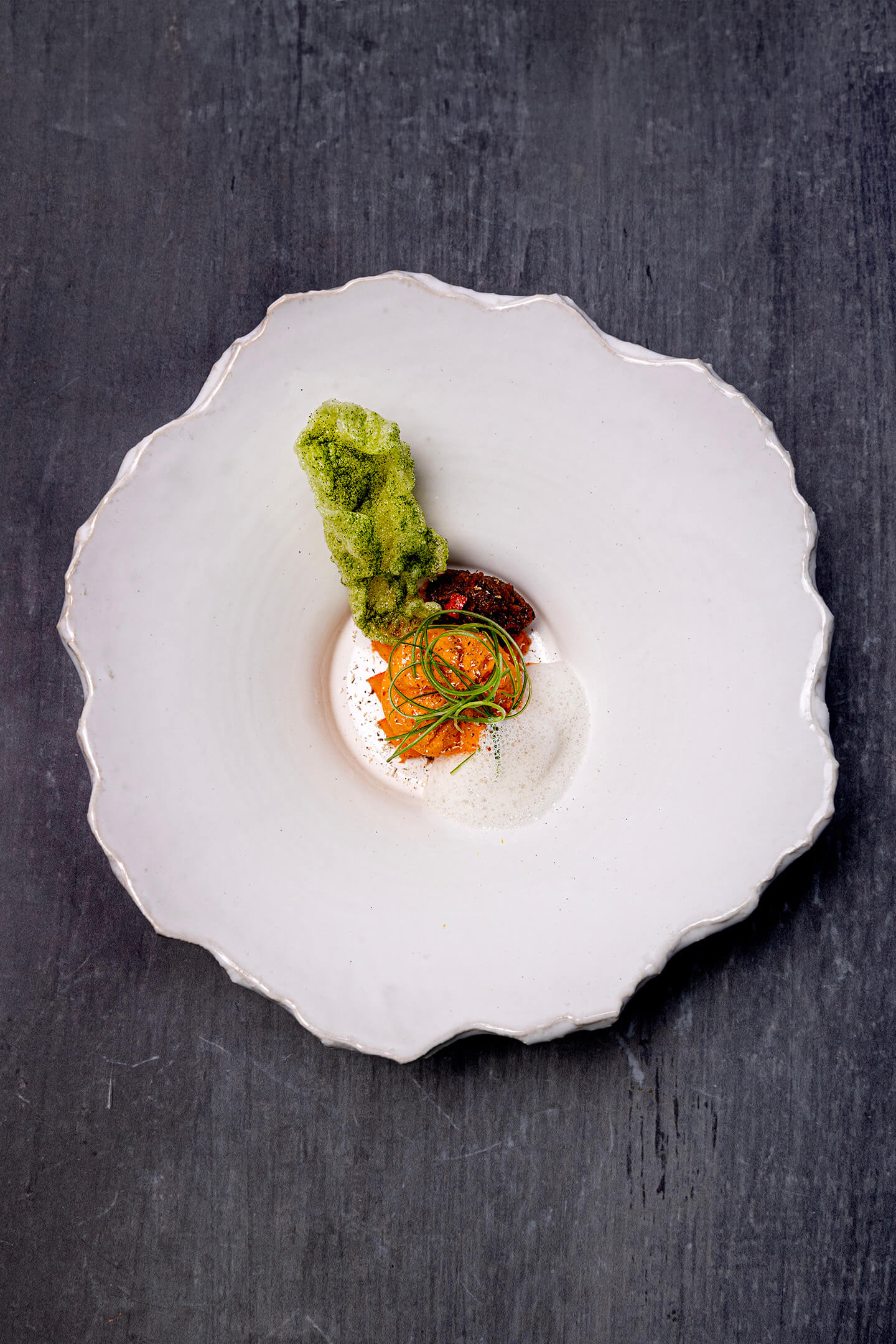 Hokkaido pumpkin with fermented oyster mushroom velouté and algae crackers